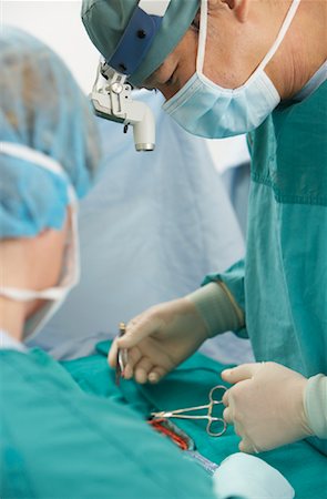 Doctors Performing Surgery Stock Photo - Rights-Managed, Code: 700-01234854
