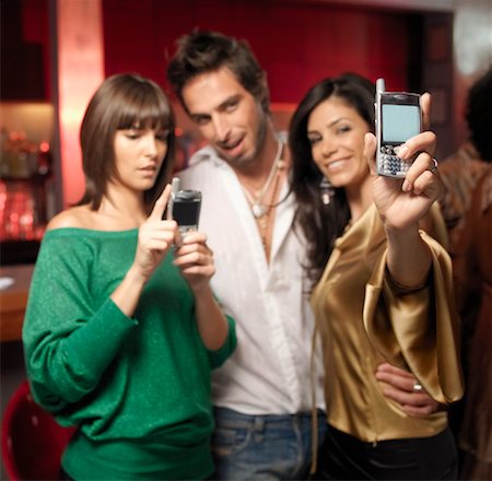 flirting at disco - Group of People in Bar Stock Photo - Rights-Managed, Code: 700-01235115