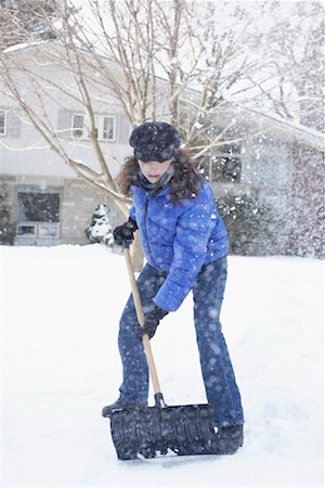 driveway winter - Woman Shoveling Snow Stock Photo - Rights-Managed, Code: 700-01235336