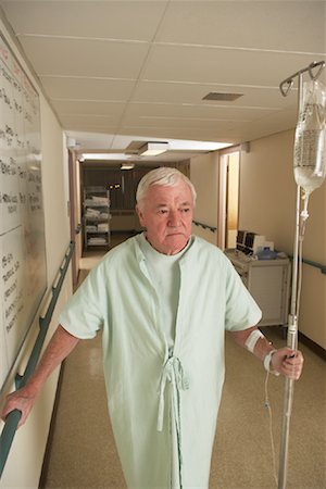 Man Walking in Hospital Stock Photo - Rights-Managed, Code: 700-01236073