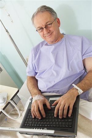 Man in Hospital Bed Stock Photo - Rights-Managed, Code: 700-01236104