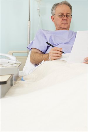 Man in Hospital Bed Stock Photo - Rights-Managed, Code: 700-01236103
