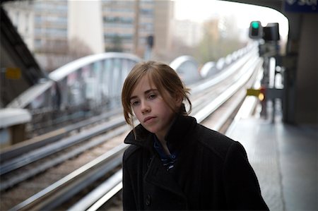 railroad track city perspective - Girl at Train Station Stock Photo - Rights-Managed, Code: 700-01236482