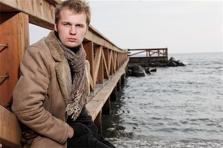 simsearch:700-01110138,k - Portrait of Man Sitting on Dock Stock Photo - Rights-Managed, Code: 700-01236529