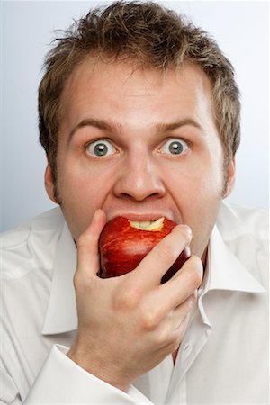 Man Eating Apple Stock Photo - Rights-Managed, Code: 700-01236532