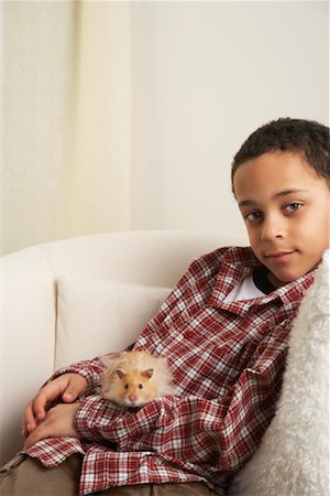 Boy Holding Hamster Stock Photo - Rights-Managed, Code: 700-01236594