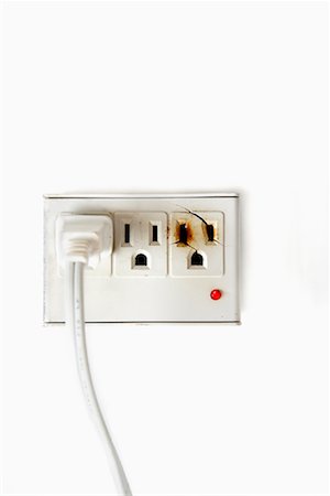 Electrical Plug in Outlet Foto de stock - Con derechos protegidos, Código: 700-01236748