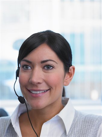 simsearch:700-01378659,k - Businesswoman Wearing Headset Stock Photo - Rights-Managed, Code: 700-01248109