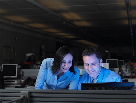 people dim light - Businesspeople Working Late Stock Photo - Rights-Managed, Code: 700-01248155