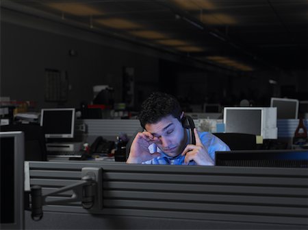 Businessman Working After Hours Foto de stock - Con derechos protegidos, Código: 700-01248150
