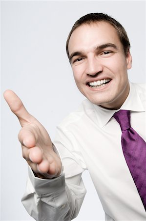 Businessman Extending Hand Stock Photo - Rights-Managed, Code: 700-01248389