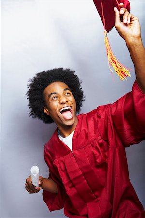 project completion - Graduate Throwing Mortarboard Stock Photo - Rights-Managed, Code: 700-01248402