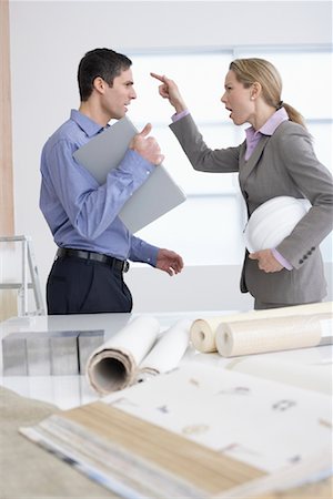 Homme et femme Fighting sur chantier Photographie de stock - Rights-Managed, Code: 700-01248620