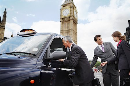 Businesspeople Getting in Taxi, London, England Stock Photo - Rights-Managed, Code: 700-01248667