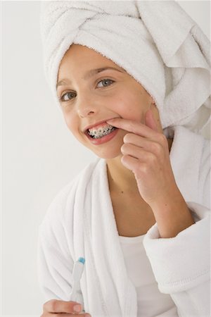 Girl Looking at Teeth Stock Photo - Rights-Managed, Code: 700-01248694