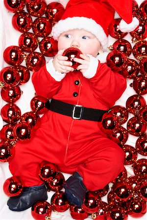 pictures of babies dressed for christmas - Baby Dressed as Santa Stock Photo - Rights-Managed, Code: 700-01249368