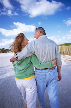 seniors embrace touching - Couple Walking at Beach Stock Photo - Rights-Managed, Code: 700-01259801