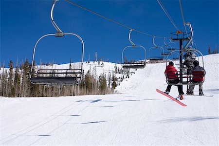 Surfeurs des neiges sur les remontées mécaniques, Utah, USA Photographie de stock - Rights-Managed, Code: 700-01260233