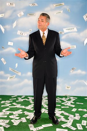 simsearch:700-01582215,k - Money Raining Down on Businessman Stock Photo - Rights-Managed, Code: 700-01260296