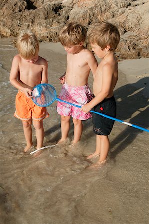 Boys Fishing Foto de stock - Con derechos protegidos, Código: 700-01260394