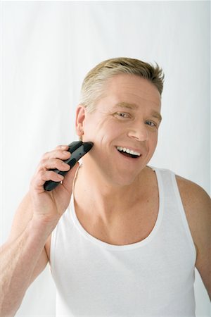 simsearch:693-03307097,k - Man Shaving Foto de stock - Direito Controlado, Número: 700-01275140