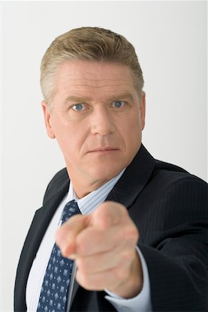 simsearch:700-00591180,k - Businessman Pointing Stock Photo - Rights-Managed, Code: 700-01275152