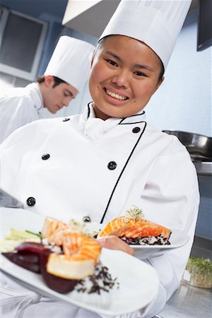 simsearch:614-03551539,k - Chef Holding Meals Stock Photo - Rights-Managed, Code: 700-01275174