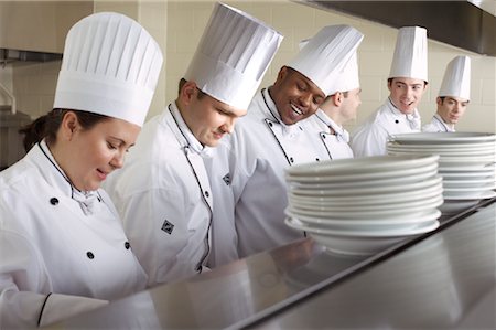 fat black man standing - Chefs in Kitchen Stock Photo - Rights-Managed, Code: 700-01275198