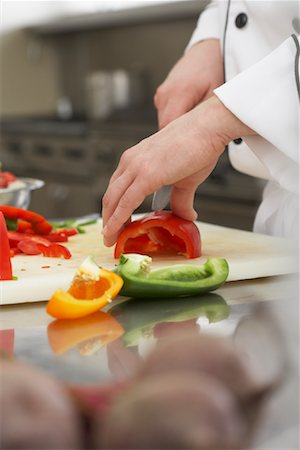 simsearch:6109-08489851,k - Chef Chopping Vegetables Stock Photo - Rights-Managed, Code: 700-01275203