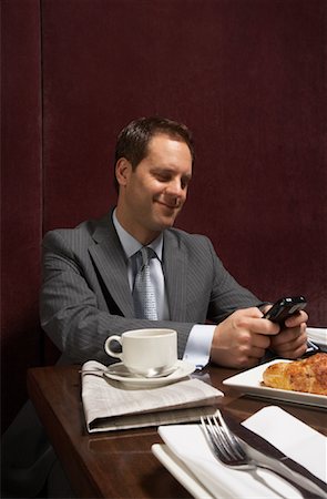 simsearch:700-01275296,k - Businessman in Restaurant Stock Photo - Rights-Managed, Code: 700-01275285