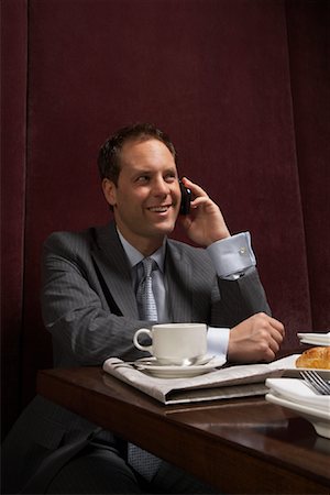 simsearch:700-01275296,k - Businessman in Restaurant Stock Photo - Rights-Managed, Code: 700-01275295