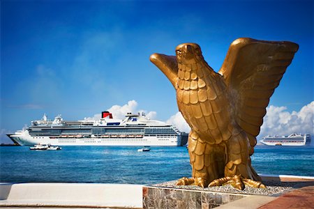 eagle statues - Eagle Statue, Cruise Ship in the Background, Cozumel, Mexico Stock Photo - Rights-Managed, Code: 700-01275370