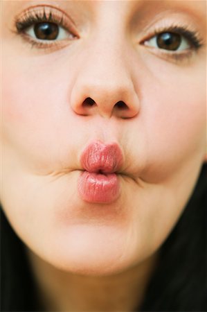 Woman Making Faces Stock Photo - Rights-Managed, Code: 700-01275870