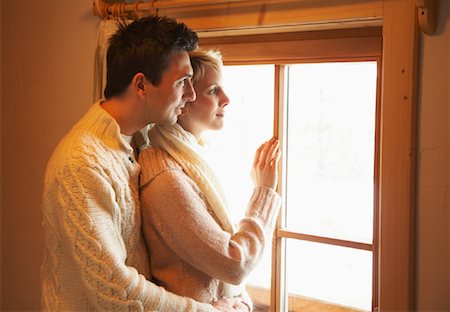 Couple Looking Out Window Stock Photo - Rights-Managed, Code: 700-01275938