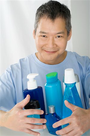 Portrait of Man with Toiletries Stock Photo - Rights-Managed, Code: 700-01276253
