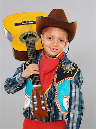 Portrait of Boy Holding Guitar Stock Photo - Rights-Managed, Code: 700-01295594