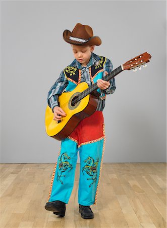 Boy Playing Guitar Photographie de stock - Rights-Managed, Code: 700-01295599