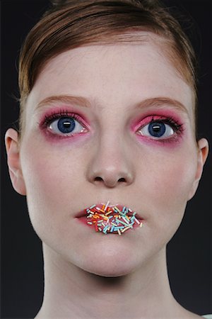 simsearch:700-00161547,k - Woman with Sprinkles on Lips Stock Photo - Rights-Managed, Code: 700-01295628