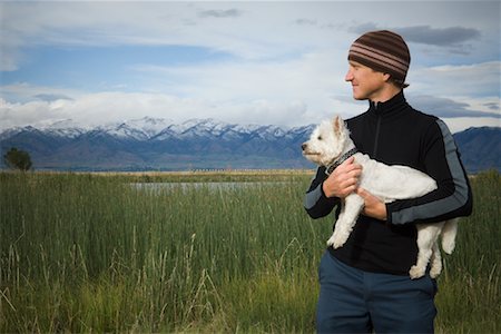 Man Holding Dog Photographie de stock - Rights-Managed, Code: 700-01296699