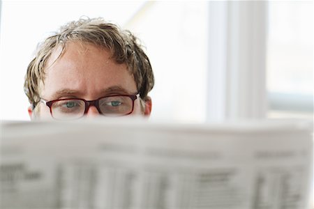 Man Reading Newspaper Stock Photo - Rights-Managed, Code: 700-01344661