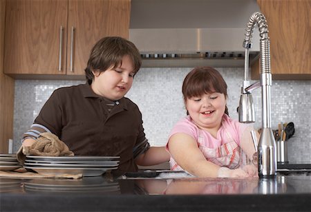 sister washing the dishes - Children Washing Dishes Stock Photo - Rights-Managed, Code: 700-01345070