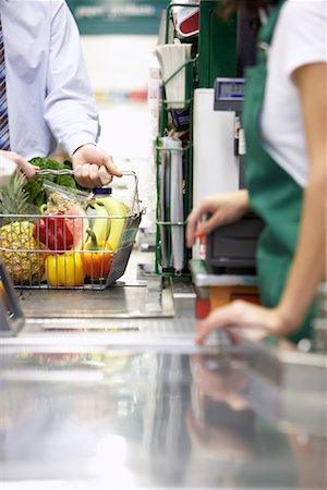 paying for grocery - Man at Check-out Counter in Grocery Store Stock Photo - Rights-Managed, Code: 700-01345689