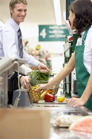 supermarket cashier - Man at Check-out Counter in Grocery Store Stock Photo - Rights-Managed, Code: 700-01345690