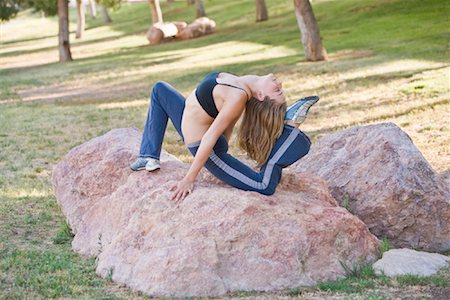 simsearch:700-00086922,k - Woman Stretching on Rock Stock Photo - Rights-Managed, Code: 700-01374519