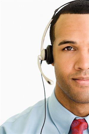 Man Using Telephone Headset Foto de stock - Con derechos protegidos, Código: 700-01378659