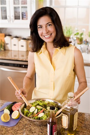 salad fork and spoon - Woman Preparing Salad Stock Photo - Rights-Managed, Code: 700-01407110