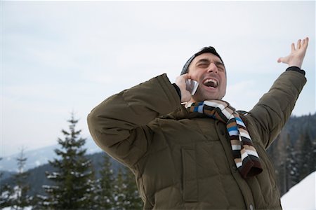 Man Yelling into Cellular Phone Stock Photo - Rights-Managed, Code: 700-01407232