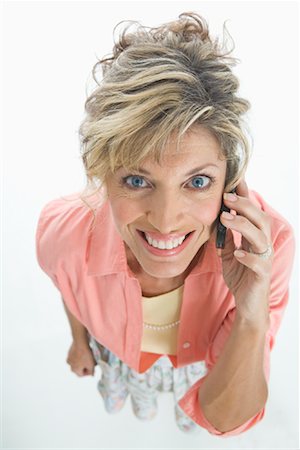 Woman Using Cellular Phone Stock Photo - Rights-Managed, Code: 700-01429055