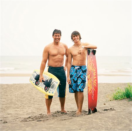pic of 18 year boy in brown hair - Father and Son with Wakeboards Stock Photo - Rights-Managed, Code: 700-01459112