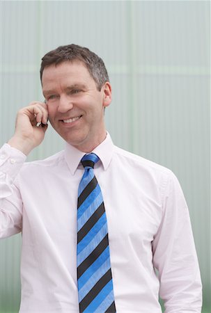 Businessman With Cell Phone Stock Photo - Rights-Managed, Code: 700-01464169